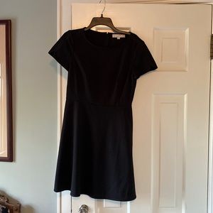 Perfect for work! Very flattering black dress. Excellent condition